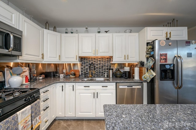 111 E Shrewsbury Dr E, Little Egg Harbor, NJ 08087 - kitchen featuring appliances with stainless steel finishes, white cabinets, decorative backsplash, and dark stone counters