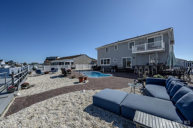 111 E Shrewsbury Dr E, Little Egg Harbor, NJ 08087 - rear view of house featuring a patio, a fenced backyard, a balcony, and outdoor lounge area