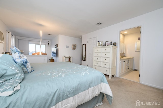 111 E Shrewsbury Dr E, Little Egg Harbor, NJ 08087 - bedroom featuring light colored carpet and ensuite bathroom