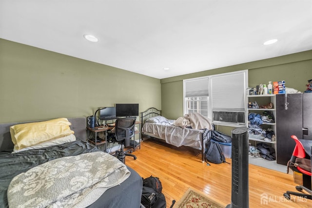 286 Easton Ave, New Brunswick, NJ 08901 - bedroom with wood finished floors, cooling unit, and recessed lighting