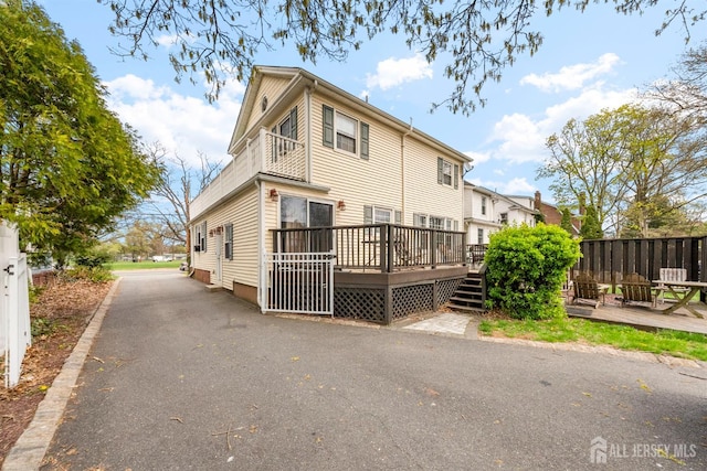 286 Easton Ave, New Brunswick, NJ 08901 - rear view of property with a wooden deck