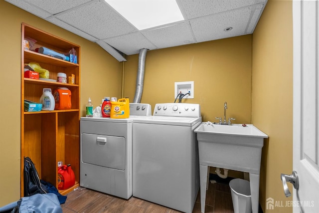 286 Easton Ave, New Brunswick, NJ 08901 - washroom with washer and clothes dryer and wood finished floors