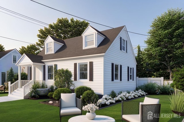 cape cod home with a front lawn