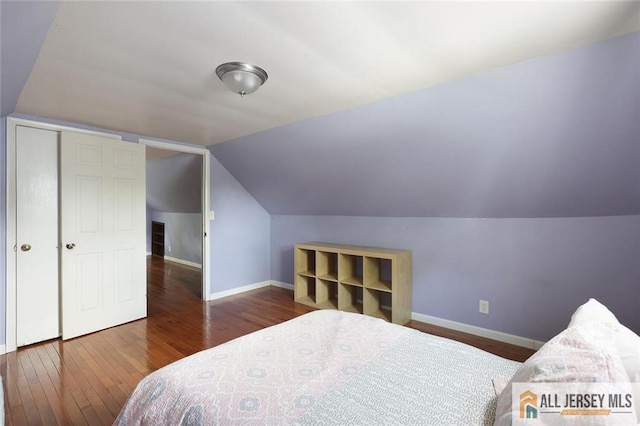 995 Old Bridge Tpke, East Brunswick, NJ 08816 - bedroom with hardwood / wood-style floors and lofted ceiling