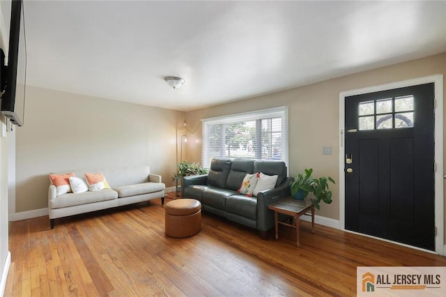 995 Old Bridge Tpke, East Brunswick, NJ 08816 - living area featuring wood finished floors and baseboards