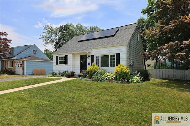 995 Old Bridge Tpke, East Brunswick, NJ 08816 - view of front of property with solar panels and roof with shingles