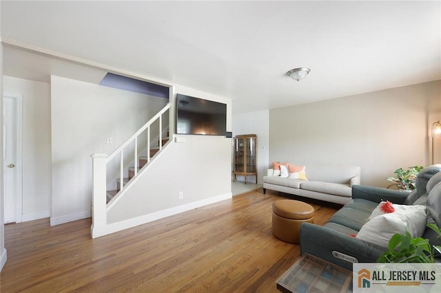 995 Old Bridge Tpke, East Brunswick, NJ 08816 - living area featuring stairs and wood finished floors