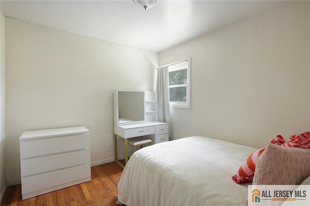 995 Old Bridge Tpke, East Brunswick, NJ 08816 - bedroom with wood finished floors and baseboards