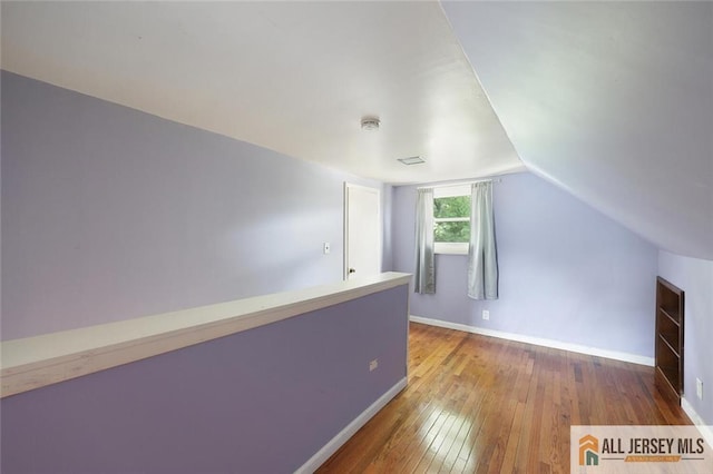 995 Old Bridge Tpke, East Brunswick, NJ 08816 - additional living space featuring wood-type flooring and lofted ceiling