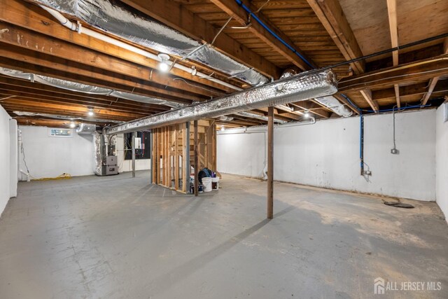 basement with heating unit