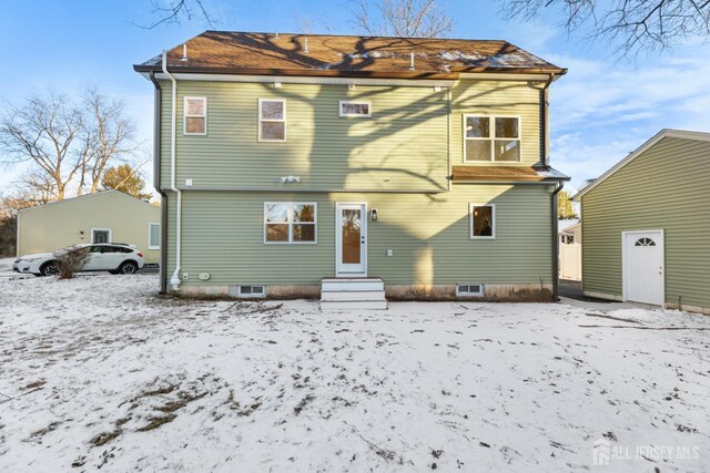 view of snow covered property