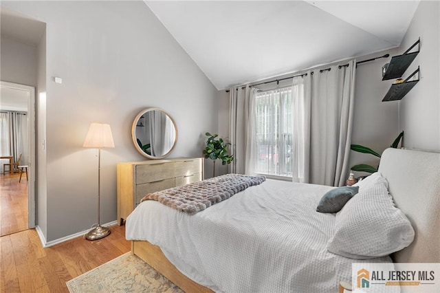 4301 Bayberry Ct, Middlesex, NJ 08852 - bedroom featuring vaulted ceiling and wood finished floors