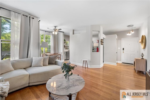 4301 Bayberry Ct, Middlesex, NJ 08852 - living room with light wood-type flooring and a ceiling fan