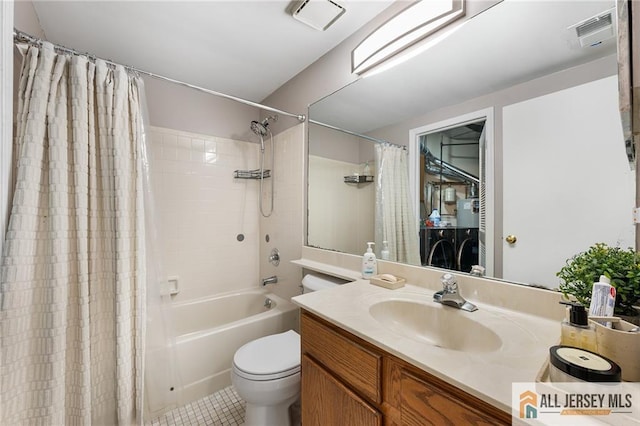 4301 Bayberry Ct, Middlesex, NJ 08852 - full bath featuring independent washer and dryer, shower / bathtub combination with curtain, vanity, and tile patterned floors