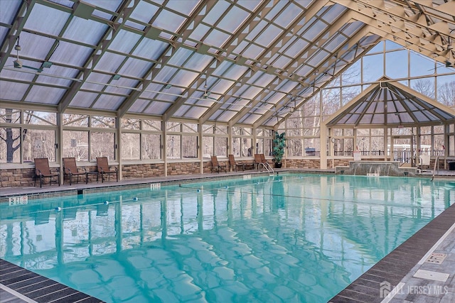 community pool featuring glass enclosure