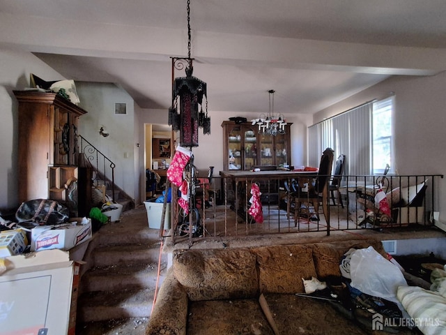 living area with stairs and visible vents