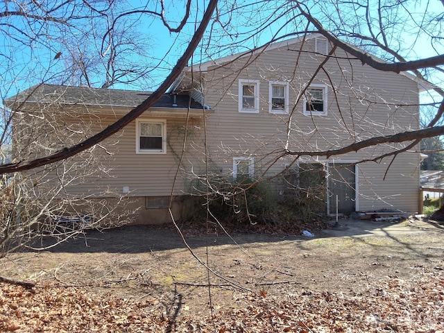 view of home's exterior with crawl space