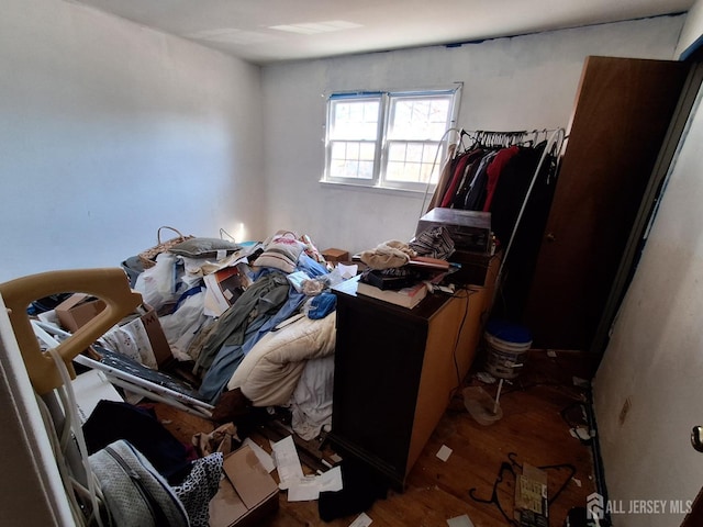 miscellaneous room featuring wood finished floors