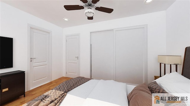 180 River Rd, Monroe, NJ 08831 - bedroom with light wood-style floors, recessed lighting, a closet, and ceiling fan