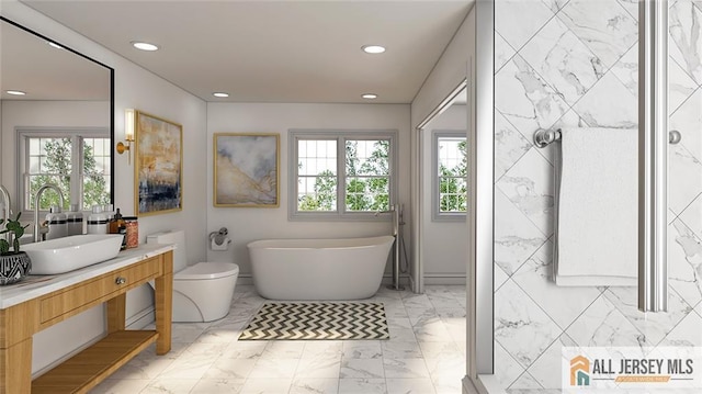 180 River Rd, Monroe, NJ 08831 - bathroom featuring vanity, recessed lighting, a freestanding bath, and marble finish floors