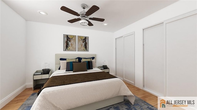 180 River Rd, Monroe, NJ 08831 - bedroom with light wood-style floors, recessed lighting, a ceiling fan, and multiple closets