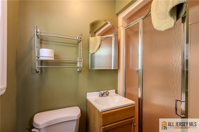 3 Revock Rd, East Brunswick, NJ 08816 - bathroom with toilet, a stall shower, and vanity