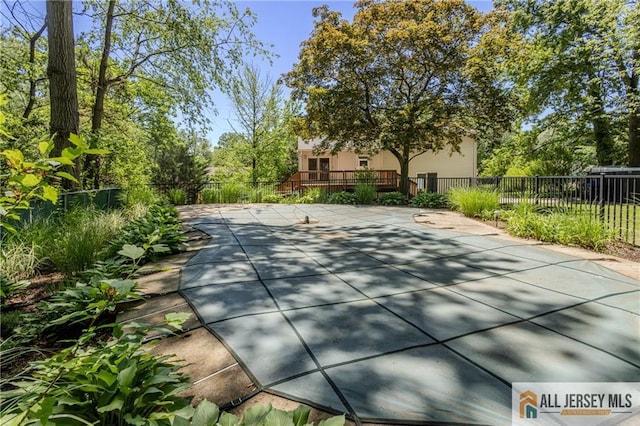 3 Revock Rd, East Brunswick, NJ 08816 - view of home's community with a wooden deck and a patio