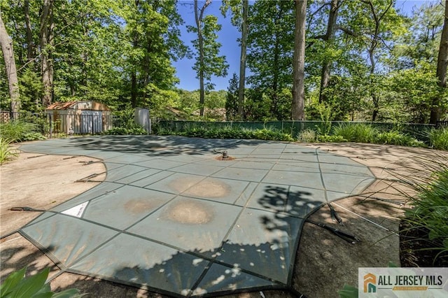 3 Revock Rd, East Brunswick, NJ 08816 - view of pool with view of scattered trees and a patio area