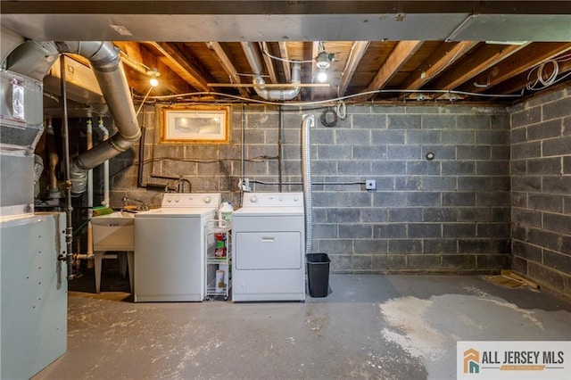 3 Revock Rd, East Brunswick, NJ 08816 - unfinished below grade area with washer and clothes dryer and a sink