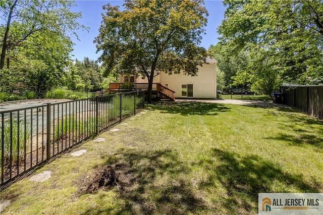 3 Revock Rd, East Brunswick, NJ 08816 - view of yard with stairway and a wooden deck