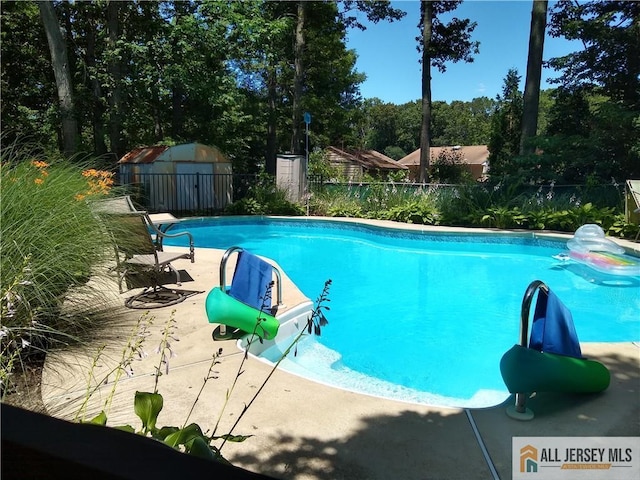 3 Revock Rd, East Brunswick, NJ 08816 - view of pool with view of scattered trees and a patio area