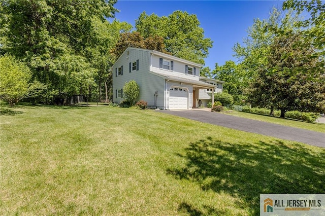 3 Revock Rd, East Brunswick, NJ 08816 - view of front facade with an attached garage, asphalt driveway, and a front yard