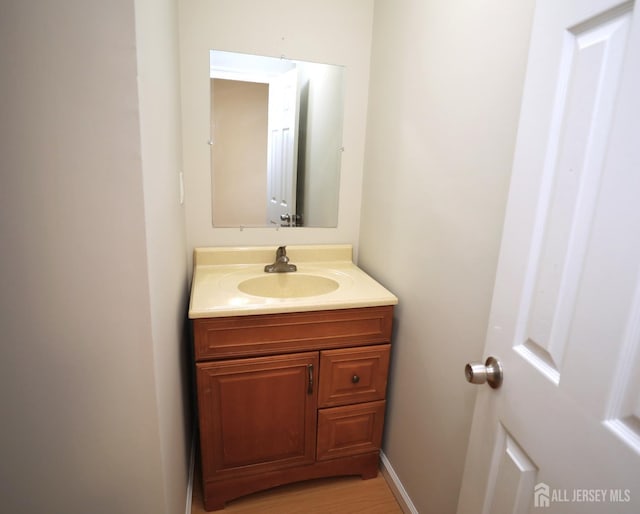 117 Nathan Dr, North Brunswick, NJ 08902 - bathroom with vanity and wood finished floors