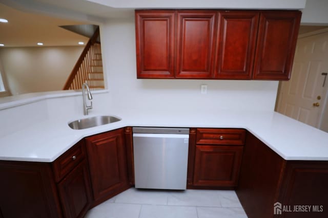 117 Nathan Dr, North Brunswick, NJ 08902 - kitchen featuring stainless steel dishwasher, dark brown cabinets, a peninsula, light countertops, and recessed lighting