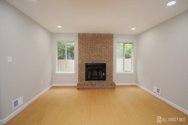 117 Nathan Dr, North Brunswick, NJ 08902 - unfurnished living room with plenty of natural light, light wood-type flooring, and recessed lighting