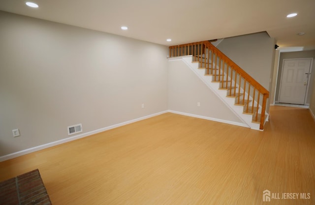 117 Nathan Dr, North Brunswick, NJ 08902 - finished basement featuring light wood finished floors, stairs, and recessed lighting