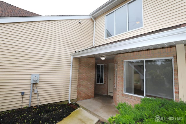 117 Nathan Dr, North Brunswick, NJ 08902 - property entrance featuring brick siding