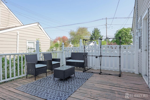 deck featuring an outdoor living space