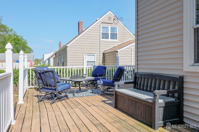 deck featuring an outdoor living space