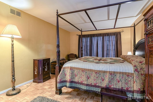 bedroom featuring light parquet flooring