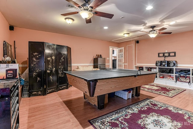 recreation room featuring wood-type flooring