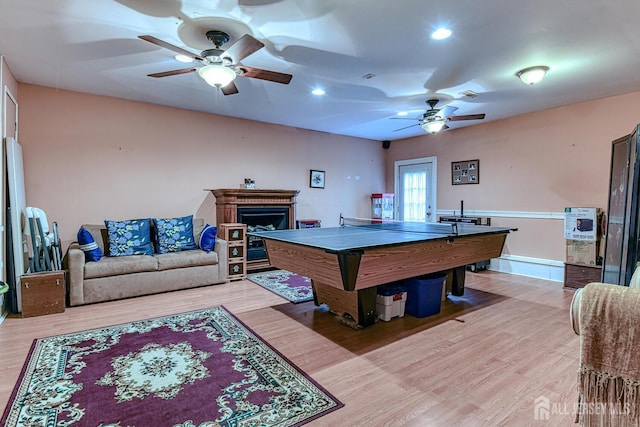 rec room with ceiling fan, wood-type flooring, and pool table