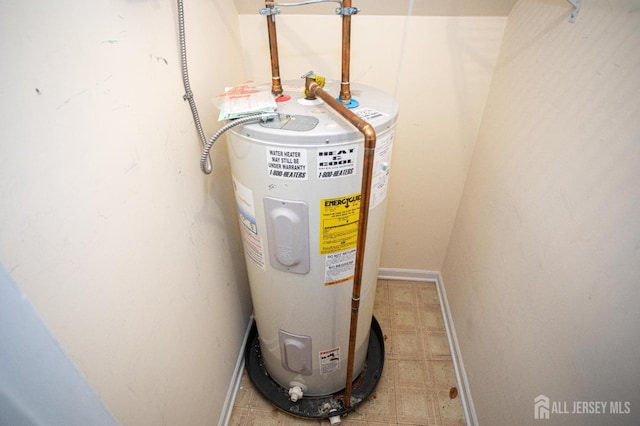 utility room with electric water heater