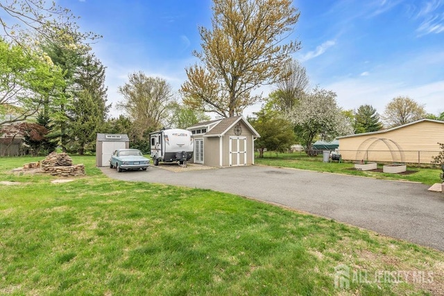 82 Hauser Ave, Hamilton, NJ 08620 - view of yard featuring a storage unit