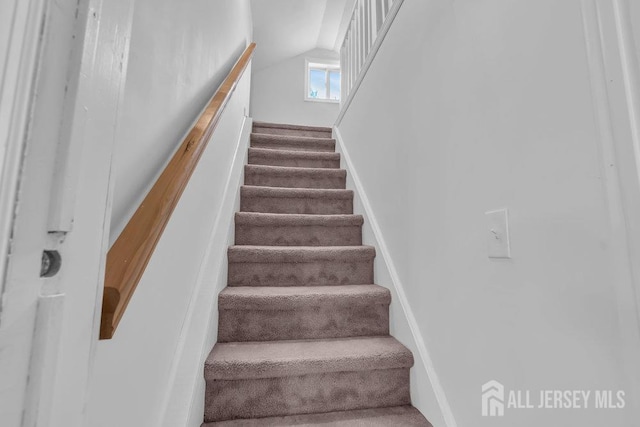 82 Hauser Ave, Hamilton, NJ 08620 - staircase with carpet flooring and lofted ceiling