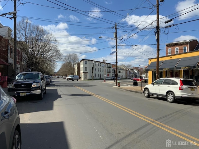 1065 S Clinton Ave, Trenton, NJ 08611 - view of asphalt street featuring street lighting, curbs, and sidewalks