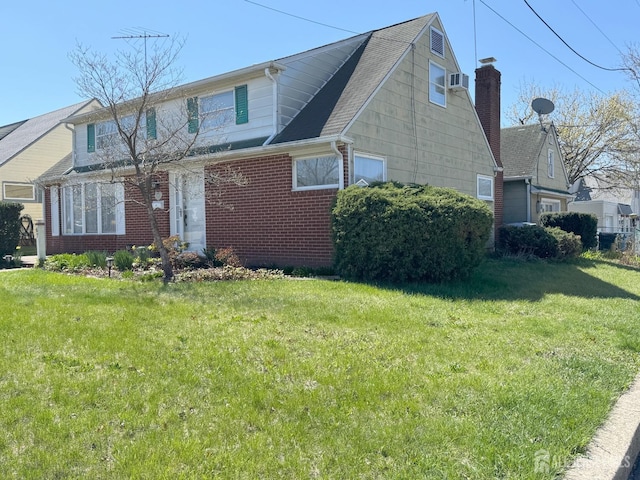 67 Park Ave, Iselin, NJ 08830 - view of home's exterior with a yard and brick siding