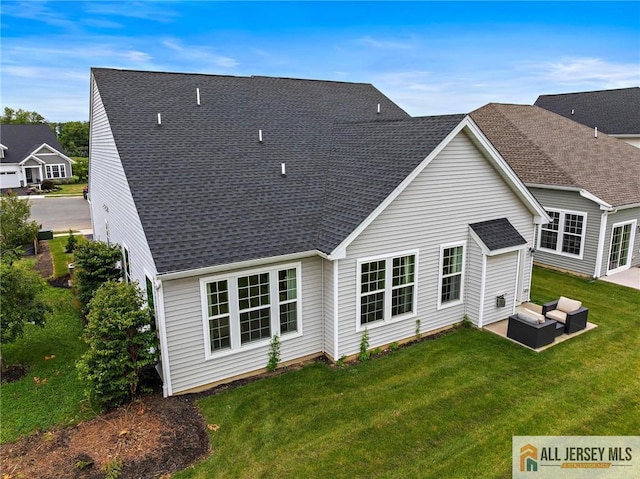15 Galerie Ct, Monroe, NJ 08831 - rear view of house featuring an outdoor living space, a yard, a patio area, and roof with shingles