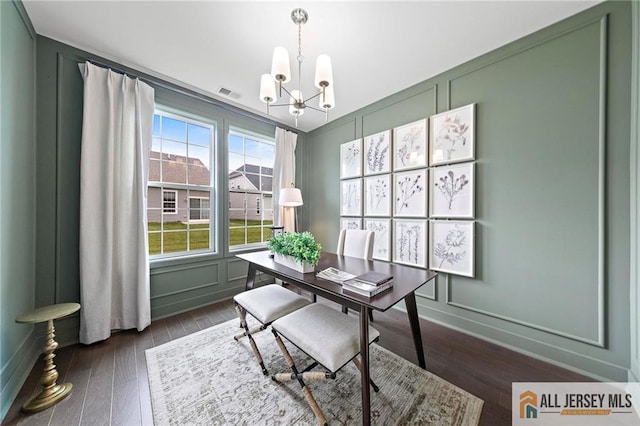 15 Galerie Ct, Monroe, NJ 08831 - office with a decorative wall, a chandelier, and dark wood-style flooring