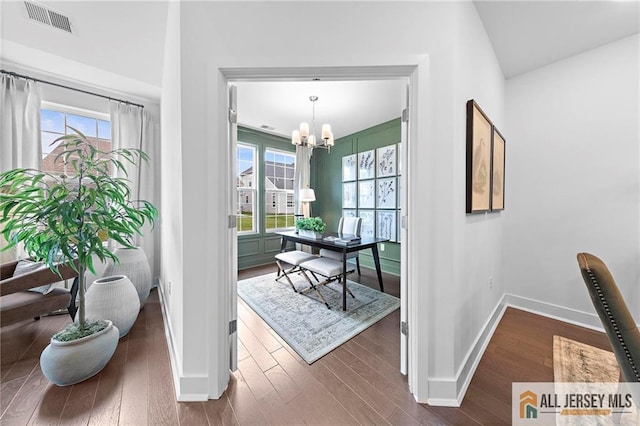 15 Galerie Ct, Monroe, NJ 08831 - dining area with hardwood / wood-style floors, plenty of natural light, a chandelier, and a desk